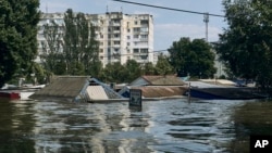 A view of a flooded neighborhood in Kherson, Ukraine, June 8, 2023. 