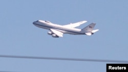 FILE - A Boeing E-4B — known as the Doomsday plane — takes off from Joint Base Andrews in the U.S. state of Maryland, May 11, 2022. The U.S. Air Force said Friday that it has awarded a $13 billion contract to Sierra Nevada Corp to develop a successor to the aircraft.