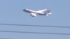 资料照片：一架波音E-4B“末日飞机”从美国马里兰州安德鲁斯联合基地起飞。（2022年5月11日）