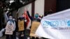 FILE: Aksi unjuk rasa memprotes kudeta militer di Myanmar, di luar kedutaan Myanmar di Jakarta, 5 Februari 2021. (REUTERS/Willy Kurniawan)