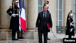 FILE - British Foreign Secretary David Cameron arrives to attend a conference in support of Ukraine with European leaders and government representatives at the Elysee Palace in Paris, France, Feb. 26, 2024.