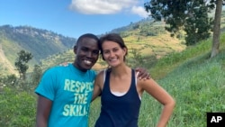 FILE - In this undated photo provided by El Roi Haiti, Alix Dorsainvil, right, poses with her husband, Sandro Dorsainvil. Alix Dorsainvil, a nurse for El Roi Haiti, and her daughter were kidnapped on Thursday, July 27, the organization said. (Courtesy of El Roi Haiti via AP)