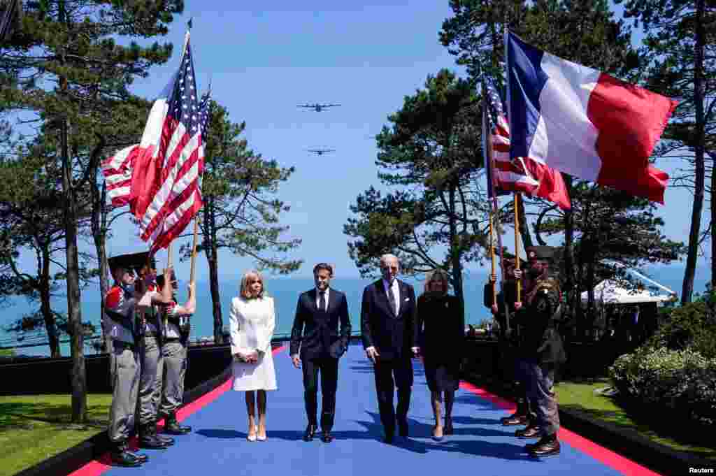 U.S President Joe Biden, first lady Jill Biden, French President Emmanuel Macron and his wife Brigitte Macron attend the 80th anniversary of D-Day at the Normandy American Cemetery and Memorial in Colleville-sur-Mer, France.