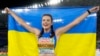 FILE - Yaroslava Mahuchikh of Ukraine smiles after winning the gold medal in the women's high jump final at the European Athletics Championships in Rome on June 9, 2024.