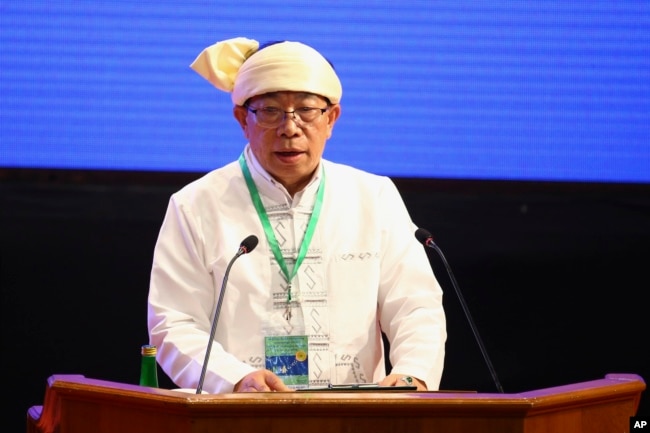 Restoration Council of Shan State-RCSS (SSA) Chairman Sao Yawd Serk, delivers a speech during a ceremony to mark the 8th anniversary of the NCA at the Myanmar International Convention Center in Naypyitaw, Myanmar, Oct. 15, 2023.