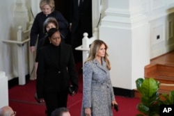 Former first ladies Melania Trump, Michelle Obama, Laura Bush and Hillary Clinton, arrive to attend a tribute service for former first lady Rosalynn Carter at Glenn Memorial Church in Atlanta, Nov. 28, 2023.