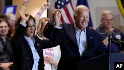 Democratic presidential nominee Vice President Kamala Harris and President Joe Biden arrive at a campaign event at the IBEW Local Union #5 union hall in Pittsburgh, on Labor Day, Sept. 2, 2024.