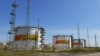 FILE - Fuel tanks are seen at a facility owned by Russia's Rosneft energy company outside the town of Neftegorsk in the Samara region, Russia, Sept. 1, 2023.