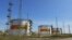 FILE - Fuel tanks are seen at a facility owned by Russia's Rosneft energy company outside the town of Neftegorsk in the Samara region, Russia, Sept. 1, 2023.
