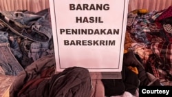 A pile of used clothes confiscated by police detectives who are part of the Anti-Illegal Import Task Force. (Courtesy Indonesian Ministry of Trade)