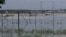 FILE - Partially-submerged small planes are seen at Cairns Airport in Cairns, Australia, Dec. 18, 2023, in this image from a video. More flooding is expected in northeast Australia as a storm gathers strength over the Coral Sea on Jan. 23, 2024. 