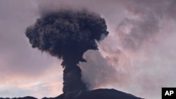 Mount Marapi spews volcanic material during an eruption in Agam, West Sumatra, Indonesia, Jan. 14, 2024.