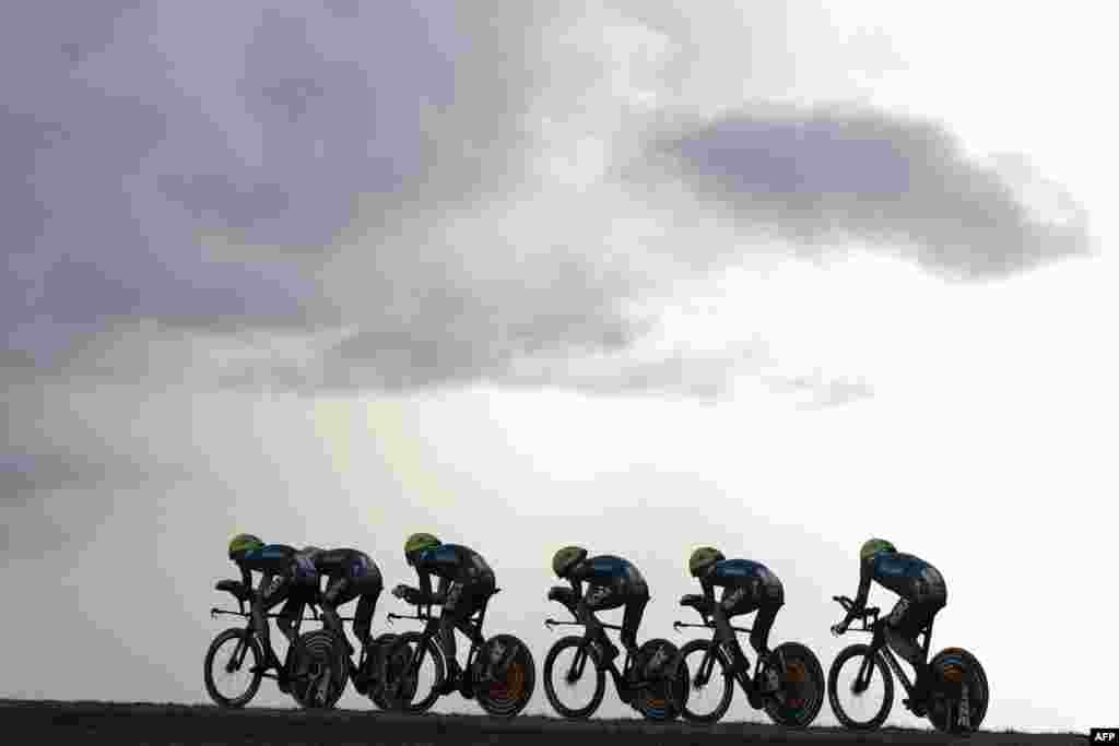 BORA-Hansgrohe&#39;s team competes during the 3rd stage of the Paris-Nice cycling race, 26,9 km team time trial between Auxerre and Auxerre, France.