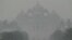 The Akshardham temple is seen amid heavy smog in New Delhi on Nov, 9, 2023. 