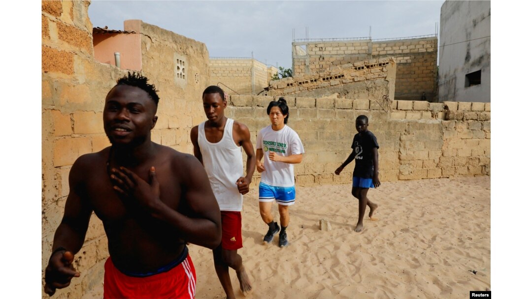 Japanese wrestler moves to Senegal to master ancient martial art