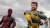 This image released by 20th Century Studios/Marvel Studios shows Ryan Reynolds as Deadpool/Wade Wilson, left, and Hugh Jackman as Wolverine/Logan in a scene from "Deadpool & Wolverine."