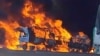 Smoke rises as a truck burns near the Myanmar-China border, near Muse, Myanmar, in this screen grab obtained from a social media video released on Nov. 23, 2023. 