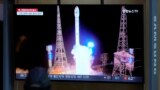 A TV screen shows a report of North Korea launching a satellite into orbit, during a news program at the Seoul Railway Station, in Seoul, South Korea, Nov. 22, 2023.