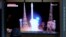 A TV screen shows a report of North Korea's spy satellite into orbit with its third launch attempt this year, during a news program at the Seoul Railway Station in Seoul, South Korea, Nov. 22, 2023.