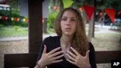 Kseniia Kucher, 16, tells about routine Russian attacks in her native Kharkiv in the rehabilitation camp for children affected by war, in Uzhhorod, Ukraine, Aug. 27, 2024.