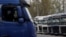 FILE - Ukrainian trucks wait at the Hungary-Ukraine border, in Zahony, Hungary, April 19, 2023. A protest by Hungarian truckers planned in Zahony on Dec. 11, reportedly will aim to slow the movement of trucks and demand restrictions on Ukrainian haulers working in the EU.

