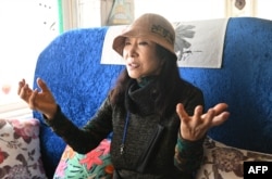 South Korean resident Kim Na-Yeon speaks during an interview with AFP at the village of Yeonpyeong island near the 'northern limit line' sea boundary with North Korea, Jan. 6, 2024.