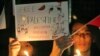 Ratusan orang dari Foreign Policy Community of Indonesia (FPCI) menggelar aksi solidaritas dengan menyalakan lilin di halaman Kedutaan Besar Palestina di Jakarta, Kamis (2/11). (VOA/Indra Yoga)