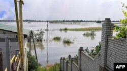 This general view shows a partially flooded area of Kherson on June 6, 2023, following the collapse of the Kakhovka hydroelectric dam. 