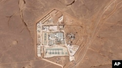 FILE - This satellite photo from Planet Labs PBC shows a military base known as Tower 22 in northeastern Jordan, Oct. 12, 2023. Three American troops were killed and 25 wounded on Jan. 28, 2024, in a drone strike in northeast Jordan, President Joe Biden said. 