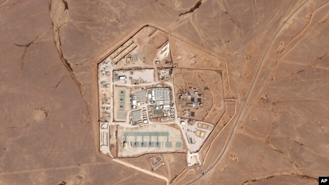 FILE - This satellite photo from Planet Labs PBC shows a military base known as Tower 22 in northeastern Jordan, Oct. 12, 2023.