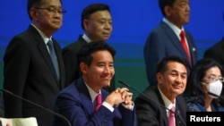 FILE - Move Forward Party leader Pita Limjaroenrat attends a press conference to announce the party's agreement with coalition partners in Bangkok, May 22, 2023.