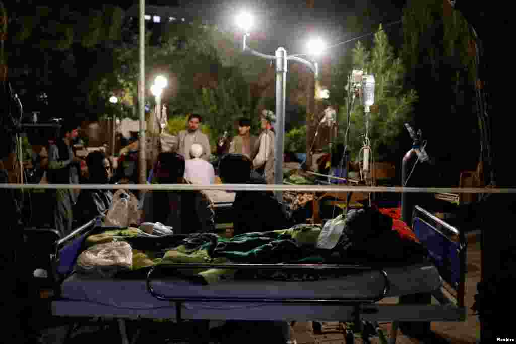 Afghans injured during the recent earthquake receive treatment at a hospital compound in&nbsp;Herat, Oct. 8, 2023.