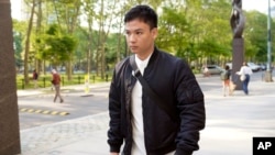 FILE - Zheng Congying leaves federal court, May 31, 2023, in the Brooklyn borough of New York.