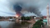 FILE: Smoke rises over Khartoum, Sudan, Wednesday, June 7, 2023. Saudi Arabia and the United States have urged Sudan's warring parties to agree to and "effectively implement" a cease-fire as the fighting in the northeastern African nation showed no signs of abating. 