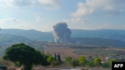 Tymi i shkaktuar nga sulmi ajror izraelit në fshatin Zibqin, në pjesën jugore të Libanit, më 25 gusht, 2024/AFP 