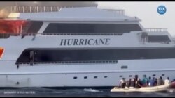 Yattaki yangından kurtulmak için denize atladı