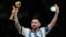 FILE - Argentina's Lionel Messi waves after receiving the Golden Ball award for best player of the tournament at the end of the World Cup final soccer match between Argentina and France in Lusail, Qatar, Dec. 18, 2022. 