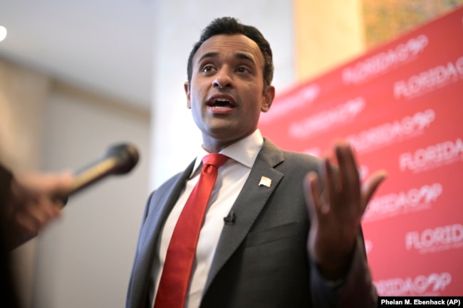 FILE - Republican presidential candidate Vivek Ramaswamy answers questions from reporters on Nov. 4, 2023, in Kissimmee, Fla. (AP Photo/Phelan M. Ebenhack, File)