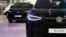 FILE - A photo taken on Jan. 20, 2023 shows the logo of German car manufacturer Volkswagen VW on an electric Volkswagen cars ID4 and ID4 GTX at a car dealership in Oslo. Norwegians bought 10,480 new EVs in August, bringing the total to 68,435 since the start of the year.