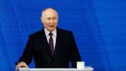 Presiden Rusia Vladimir Putin menyampaikan pidato tahunannya di hadapan Majelis Federal, di Moskow, Rusia, 29 Februari 2024. (Foto: REUTERS/Evgenia Novozhenina)