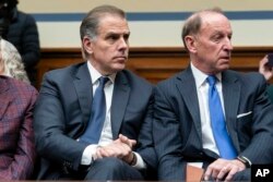 Hunter Biden accompanied by his attorney Abbe Lowell, sits in the front row at a House Oversight Committee hearing, Jan. 10, 2024, on Capitol Hill in Washington.