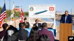 Gov. Stephen Roe Lewis gives a speech during the signing of an agreement with the U.S. Army Corps of Engineers to put solar panels over irrigation canal on the tribe’s land near Chandler, Ariz., Nov. 9, 2023. (Gila River Indian News via AP)