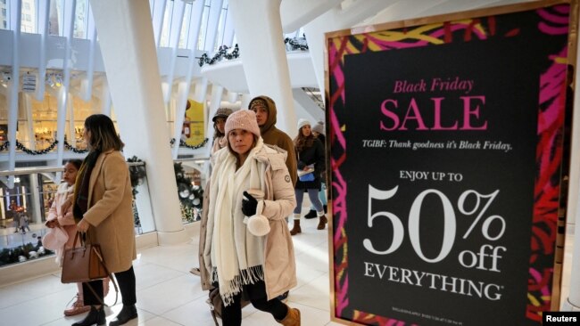 People shop at the Shops at the Oculus and Westfield Shops during Black Friday shopping in New York City, Nov. 24, 2023.