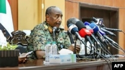 FILE - This handout image posted on the Sudanese Armed Forces's facebook page on Aug. 24, 2024, shows army chief General Abdel Fattah al-Burhan giving a press conference in Port Sudan, in Red Sea state.