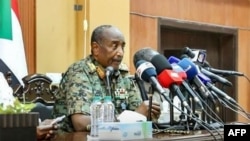 This handout image posted on the Facebook page of the Sudanese Armed Forces' on Aug. 24, 2024, shows army chief General Abdel Fattah al-Burhan giving a press conference in Port Sudan, in the Red Sea state.