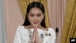 Thailand's new Prime Minister Paetongtarn Shinawatra talks to media members after receiving a royal letter of endorsement for the post at the Pheu Thai party headquarters in Bangkok, Aug. 18, 2024.