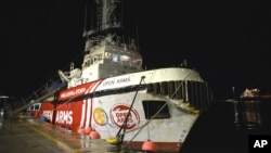 The ship belonging to the Open Arms aid group is seen docked as it prepares to ferry some 200 tons of rice and flour directly to Gaza, at Larnaca harbor, Cyprus, on March 8, 2024.