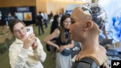 FILE - Humanoid robot Sophia during the ITU's 'AI for Good' Global Summit in Geneva, Switzerland, July 5 2023. Robotics innovators, AI creations joined UN diplomats from July 6-7.