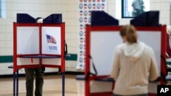 Voters fill out their Michigan primary election ballots on February 27, 2024 in Grosse Pointe Park, Michigan. Michigan is the last major primary state before Super Tuesday and a key swing state in the November election.