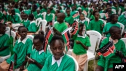 FILE - Kenyan students attending celebrations of Kenya's 60th Independence Day, also known as Jamhuri Day, at the Uhuru Gardens in Nairobi on Dec. 12, 2023. 
